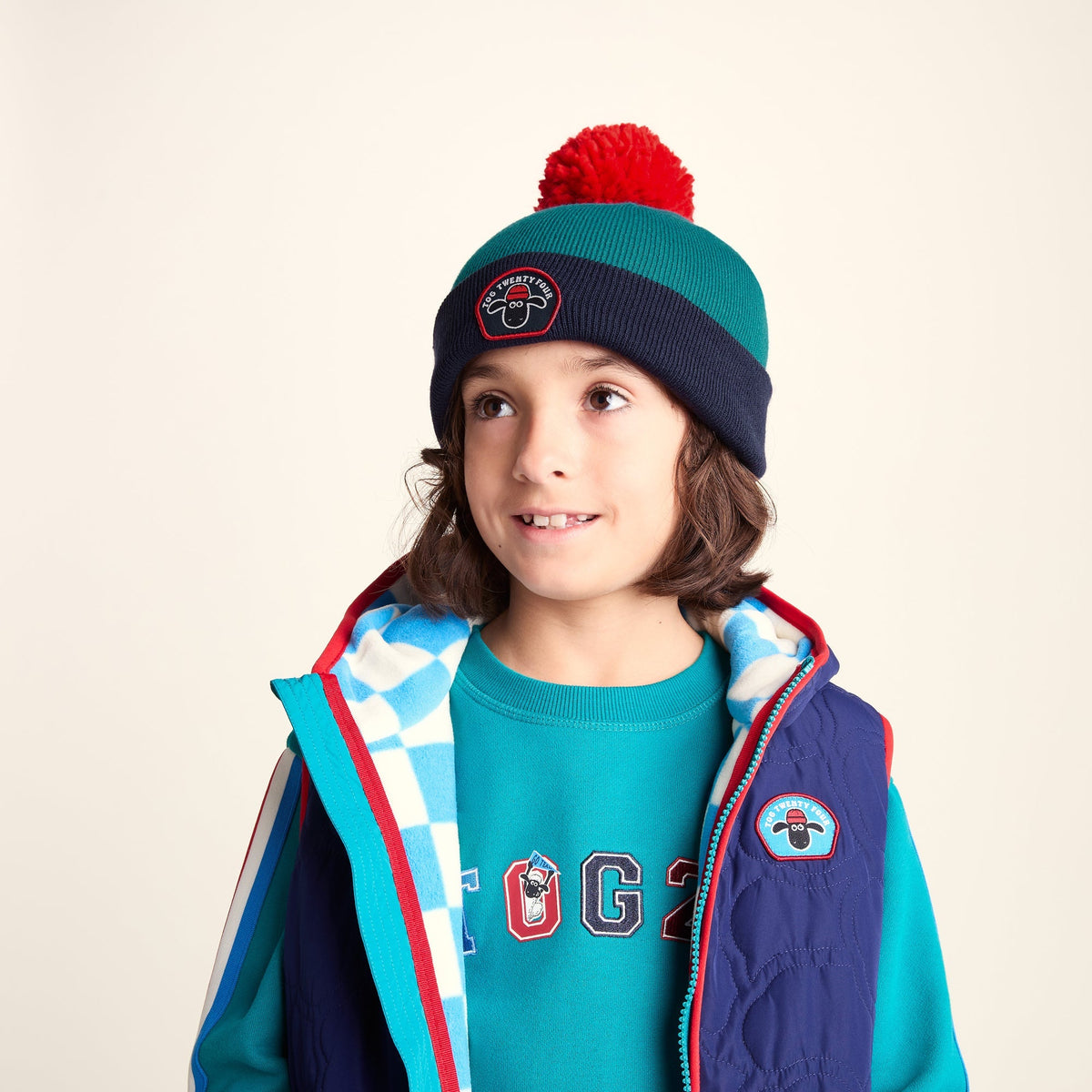 Beulah Shaun the Sheep Kids Knitted Beanie Pom Pom Hat - Peacock Green/Night Blue - Image 2