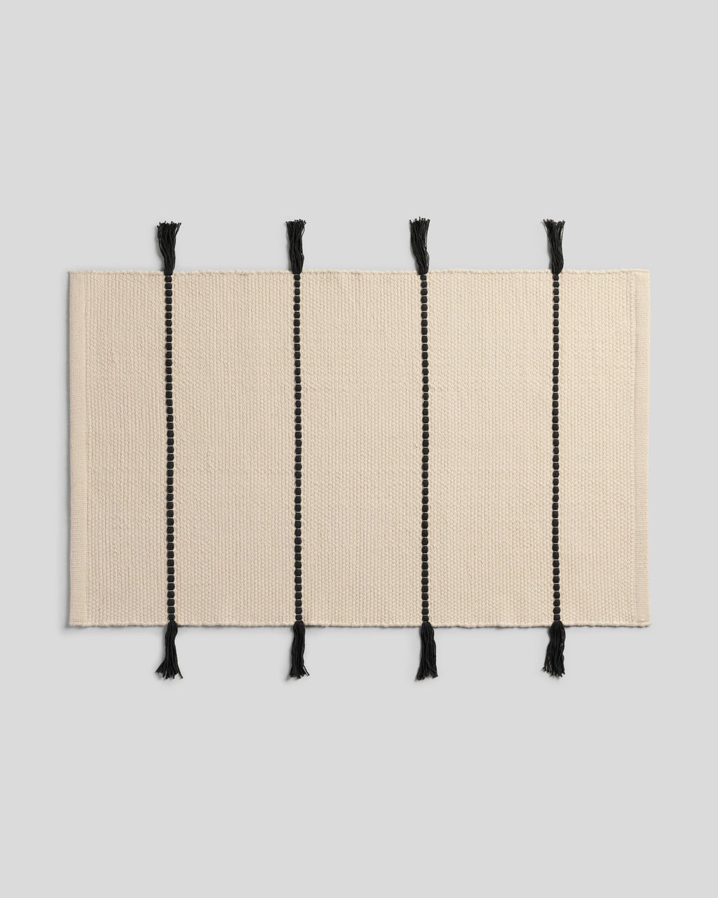 Organic Tassel Bath Rug (Natural and Onyx)