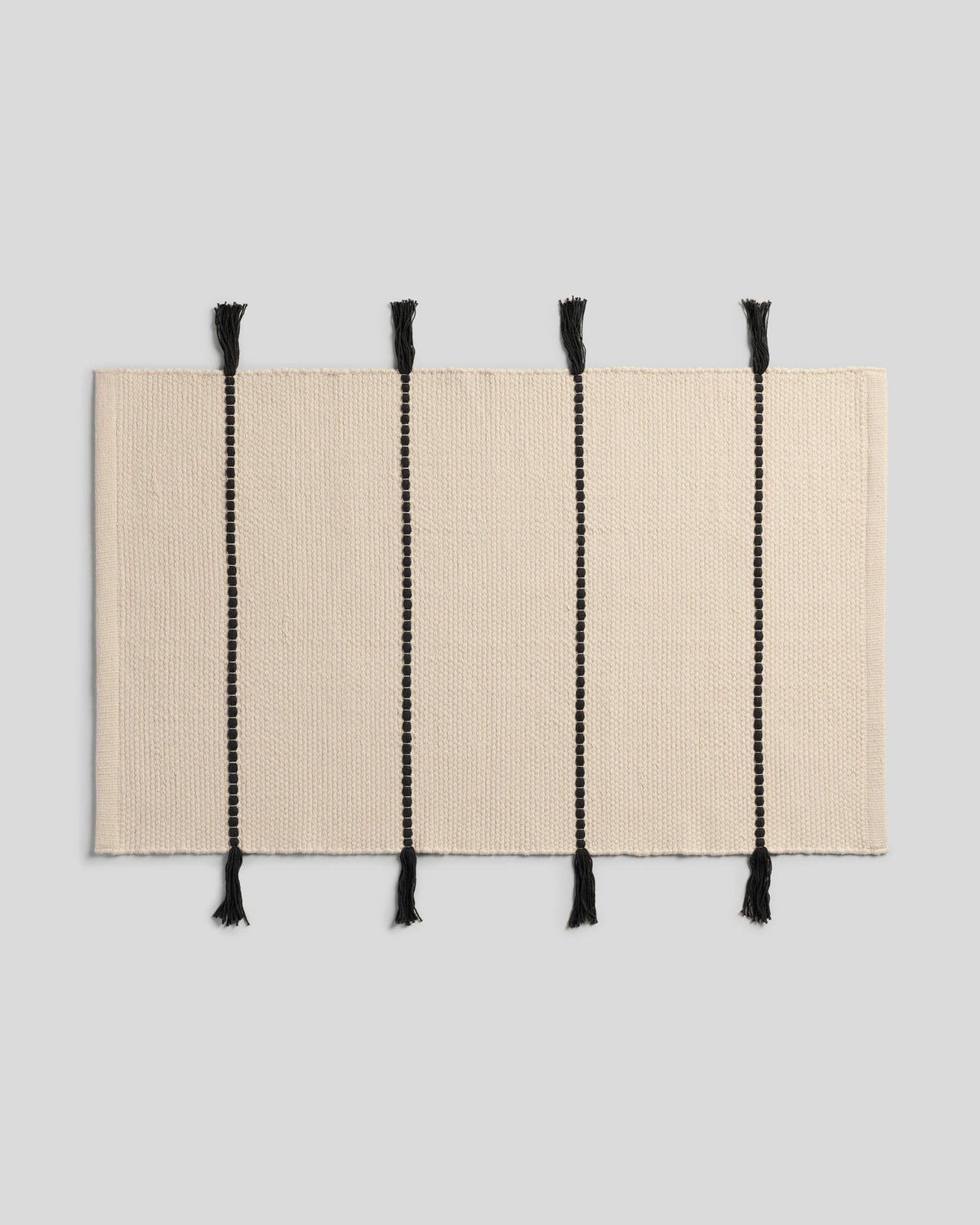 Organic Tassel Bath Rug (Natural and Onyx)